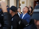 7 часа, след като ДАНС и ГДБОП влязоха в сградата на общината: Изведоха с белезници кмета на Белица Радослав Ревански
